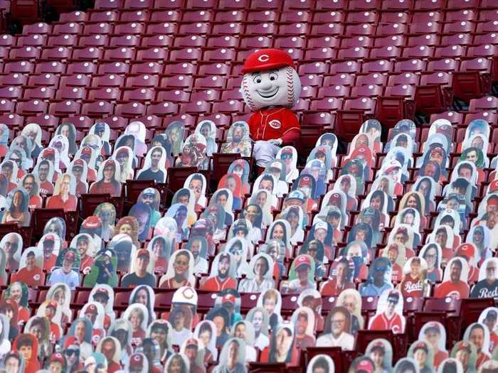 Aside from the Cincinnati Reds mascot Mr. Red, the stands in Great American Ball Park are now filled with cardboard fan cutouts.