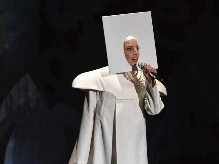 No one quite knew what to expect when Lady Gaga emerged wearing this all-white outfit and square for her 2013 performance, but it lent itself to a number of costume changes.