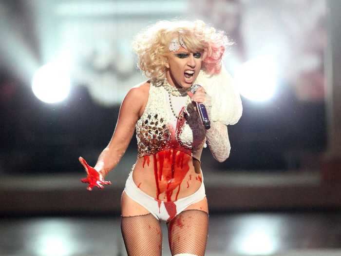 While singing "Paparazzi," Gaga ended her performance smeared with "blood" to portray the idea that "fame kills."