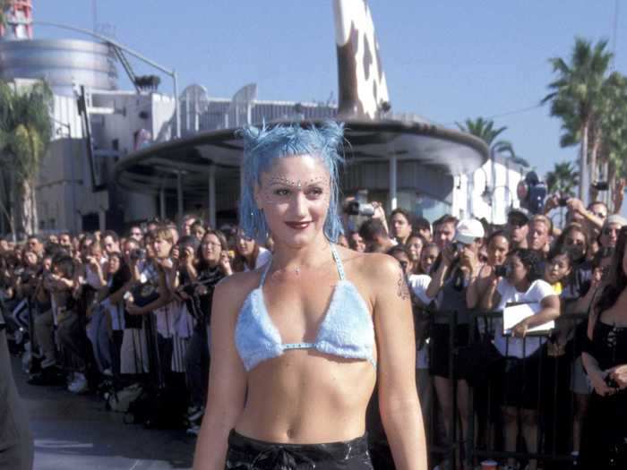 Gwen Stefani covered herself in jewels and henna with a skirt over pants in 1998.