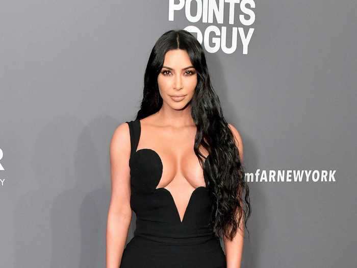 Kardashian West opted for a revealing geometric neckline with this Versace number.