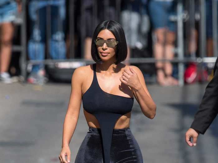 For an appearance on "Jimmy Kimmel Live" in 2018, Kardashian West wore a tank top designed with a tail, Lisa Marie Fernandez leggings, and Yeezy heels.