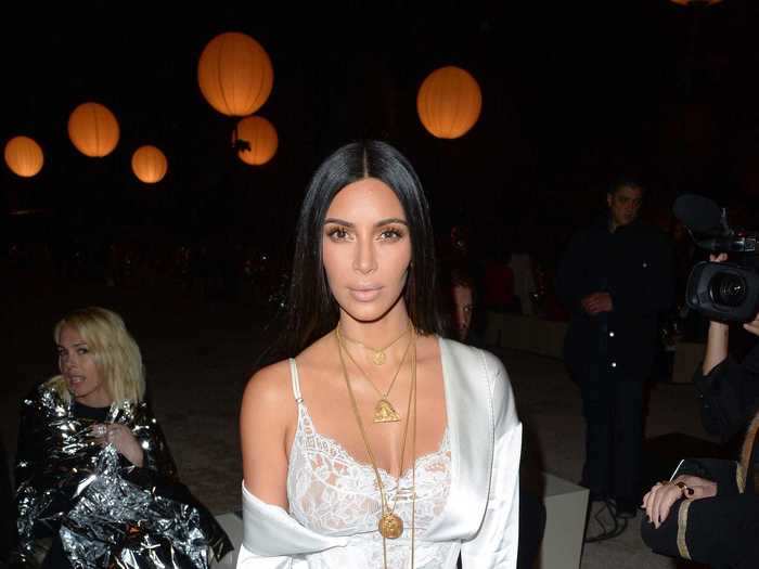 Kardashian West attended the Givenchy Paris Fashion Week show in 2016 wearing a lace dress and silk jacket from the designer.