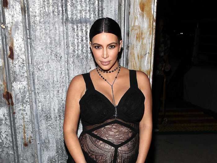 Kardashian West flaunted her pregnancy in a custom Givenchy gown at the designer