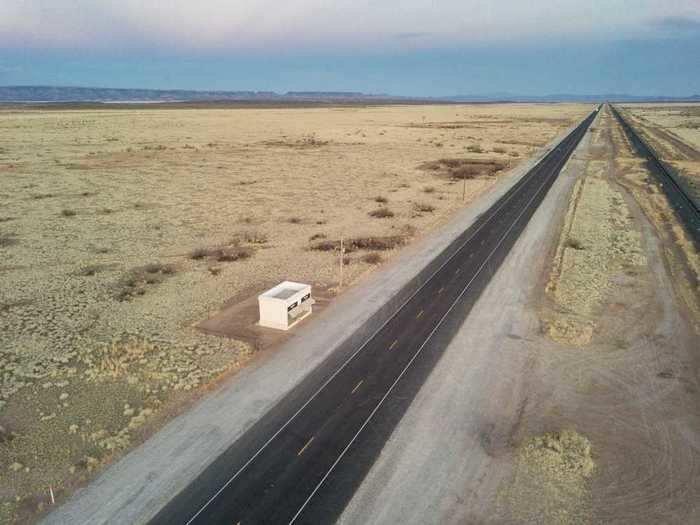 A few miles outside of Valentine, Texas, is a fully stocked Prada store on the side of a barren highway.