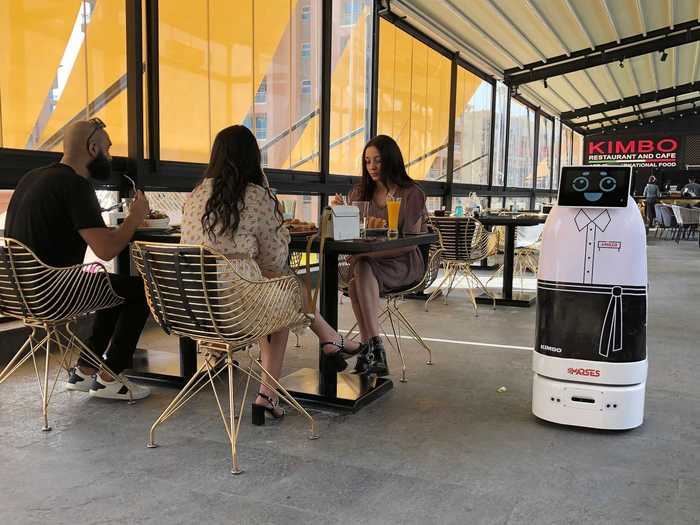 At Kimbo Restaurant and Cafe in East Cairo, a robot server takes and delivers orders to limit human contact, Market Watch reported.