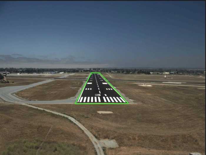 The green outline indicates that the software recognizes it as a runway and data will be collected to analyze how the plane behaves as it approaches land.