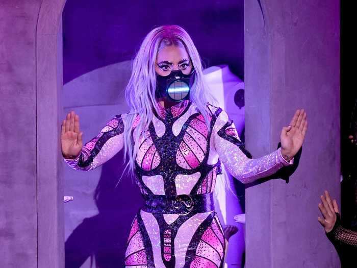 Gaga finished off her performance in the same LED mask but changed into a sparkly bodysuit and black booties.