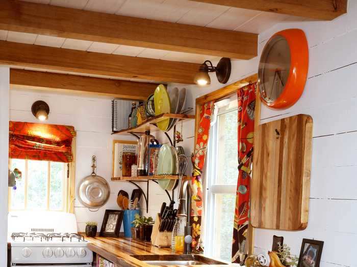 The reclaimed wood continues into the kitchen.