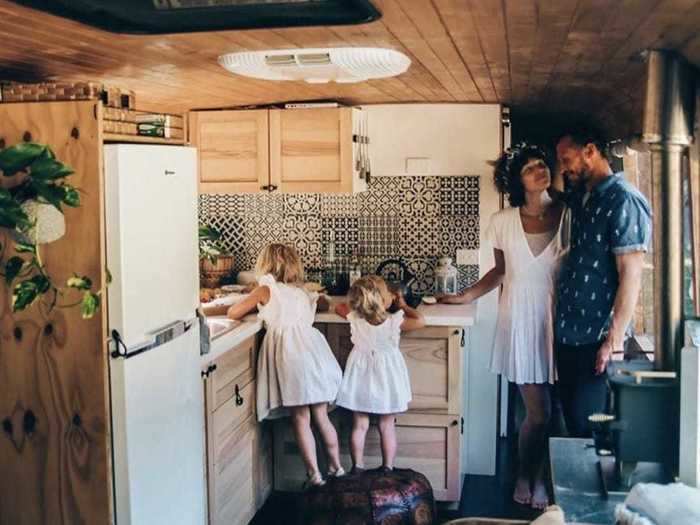 The family of four now travels around Australia in their converted schoolie.