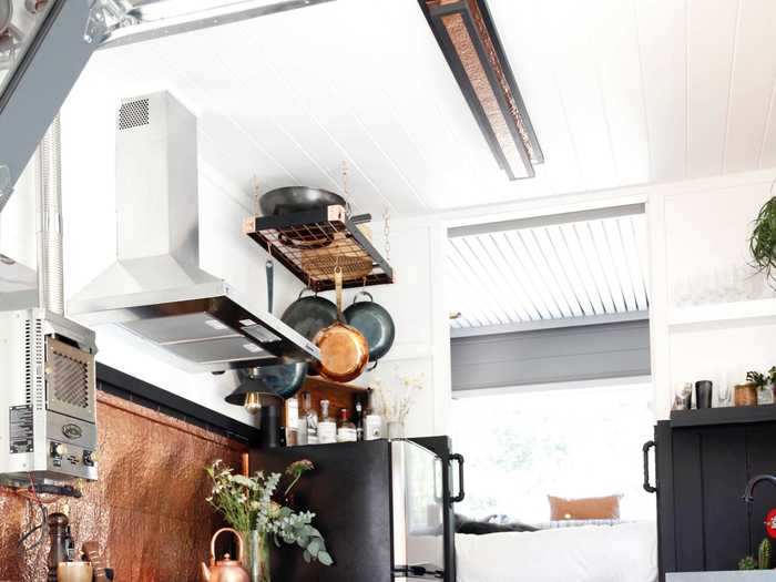 The kitchen sits on a raised platform, which separates it slightly from the rest of the space.