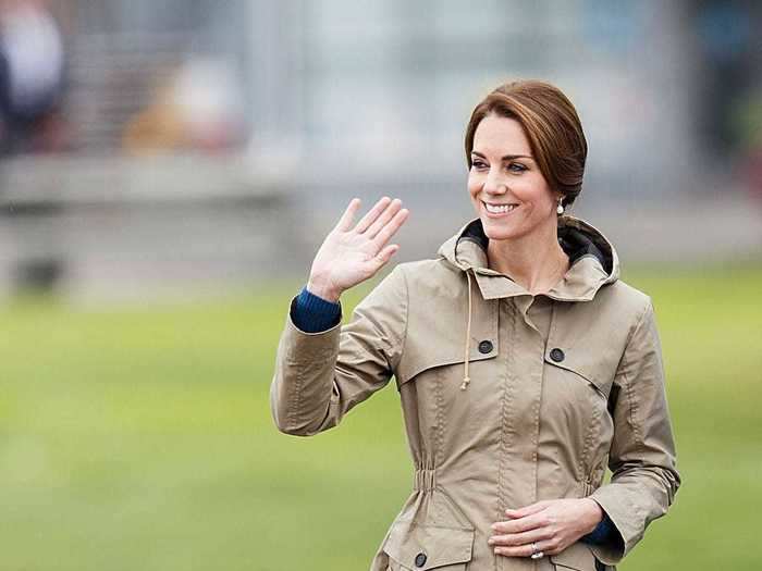 Later that day, she styled the same jeans more casually with a pair of Superga sneakers and a raincoat.