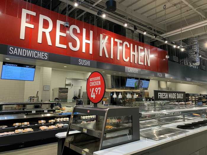 At the "Fresh Kitchen," customers can order sandwiches, sushi, and other made-to-order items.