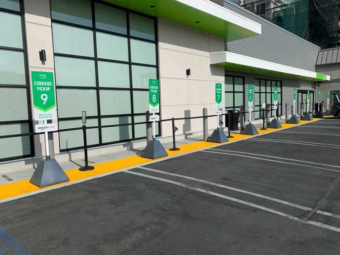 Several lanes outside the store are devoted to parking for curbside pickup and for Amazon Flex drivers, who deliver Amazon Prime orders to customers.