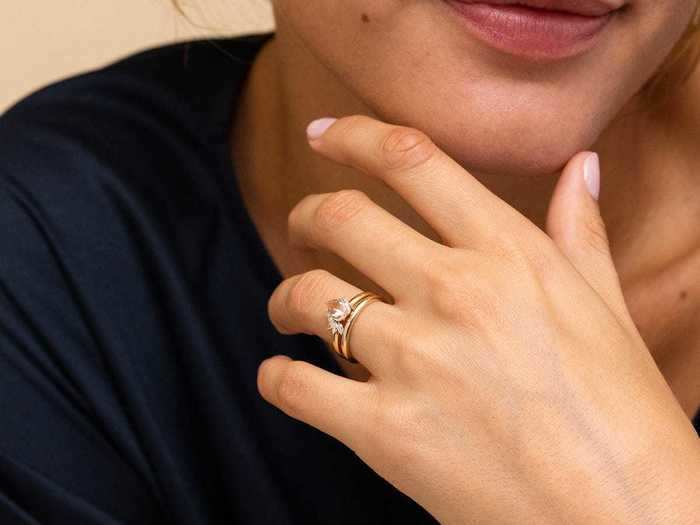 An elegant pear cut peach morganite ring