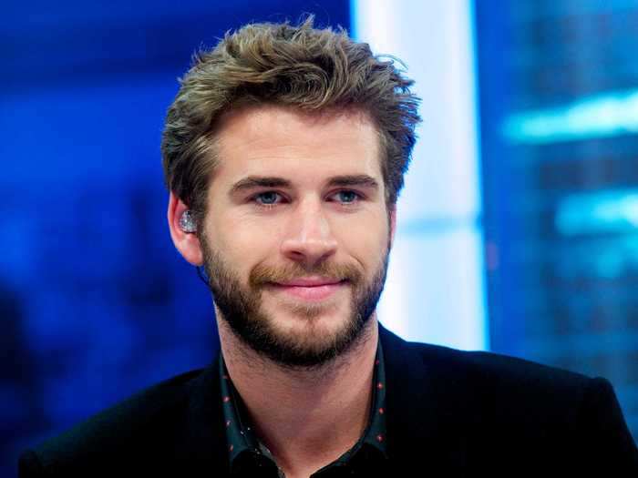 September 2013: Hemsworth reportedly kissed another woman.