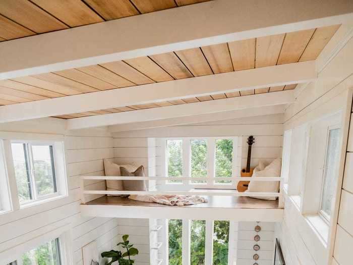 The entryway leads right into the living room, which has 13-foot ceilings.