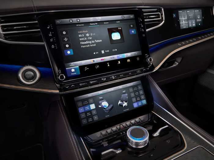 The front center console has a 12.1-inch main display and a 10.25-inch touchscreen underneath that.