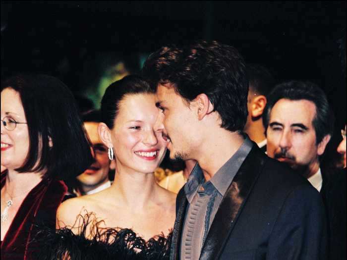 Kate Moss wore a vintage black strapless dress to attend the Cannes Film Festival in 1998 with then-boyfriend Johnny Depp.