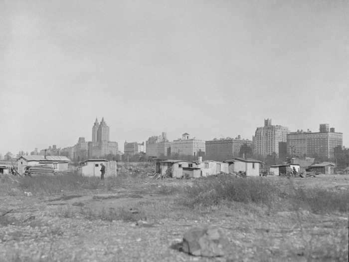 The contrast between the small shacks — at least one was an actual hole in the ground — beneath some of New York