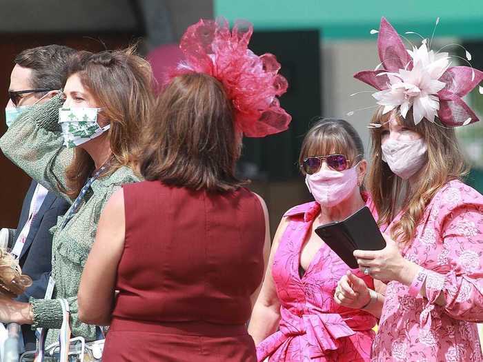 Though there were far fewer people present for Kentucky Oaks Day, guests kept the pink tradition alive.