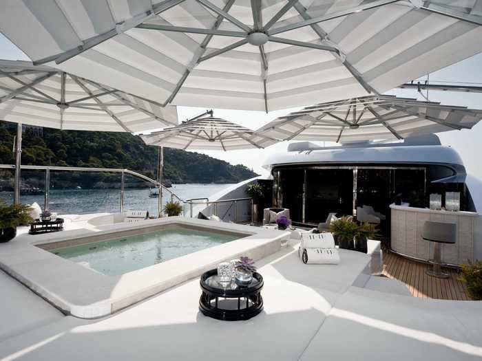 The sun deck sports a mosaic-decorated jacuzzi and an Italian-stone bar.