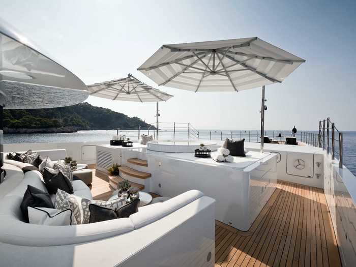 It opens up onto a private deck with a lounge area ...