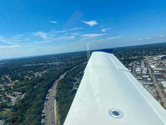 We were airborne within seconds of advancing the throttle. If I was driving on that road below the wing, it would