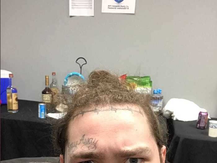 Malone has a small Playboy bunny symbol on his face.