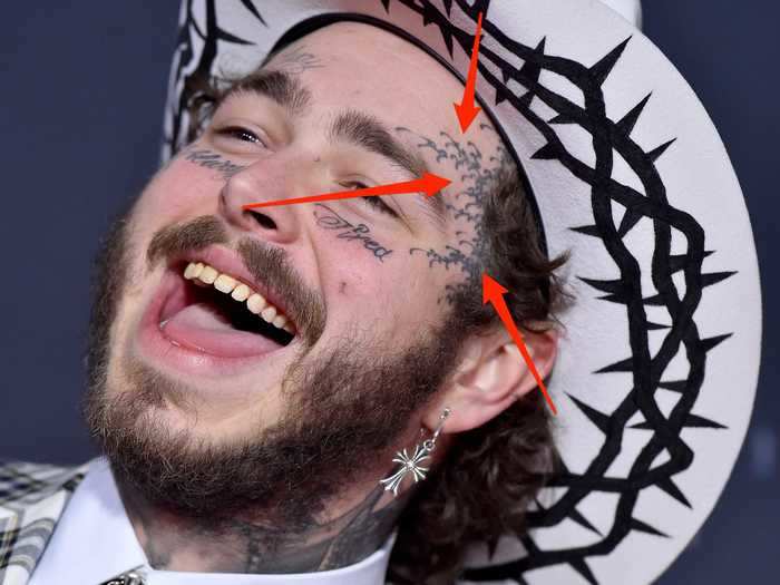 Malone got an abstract pattern tattooed on the side of his forehead during a trip to Tokyo.