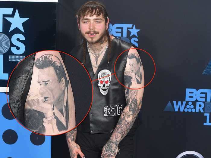 He has a portrait of Johnny Cash, one of his favorite country artists, on his arm.