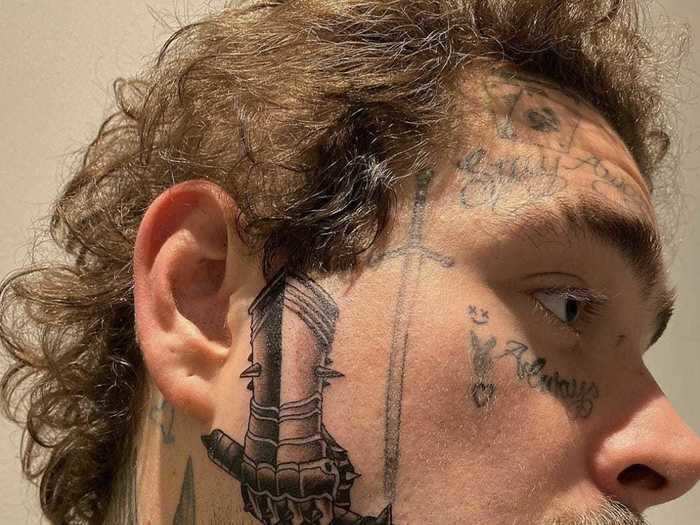 Malone said the massive "gauntlet" tattoo on the side of his face "hurt like a motherf---er."