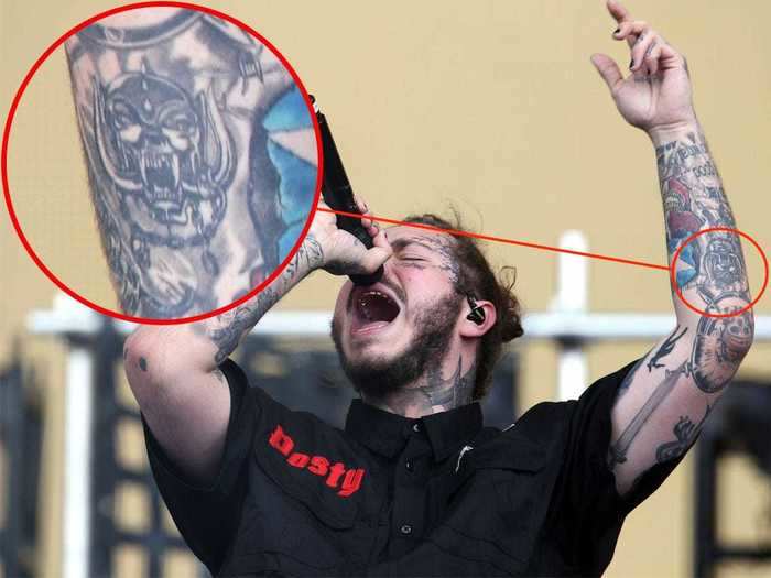 He has the logo for the English rock band Motorhead on his arm.