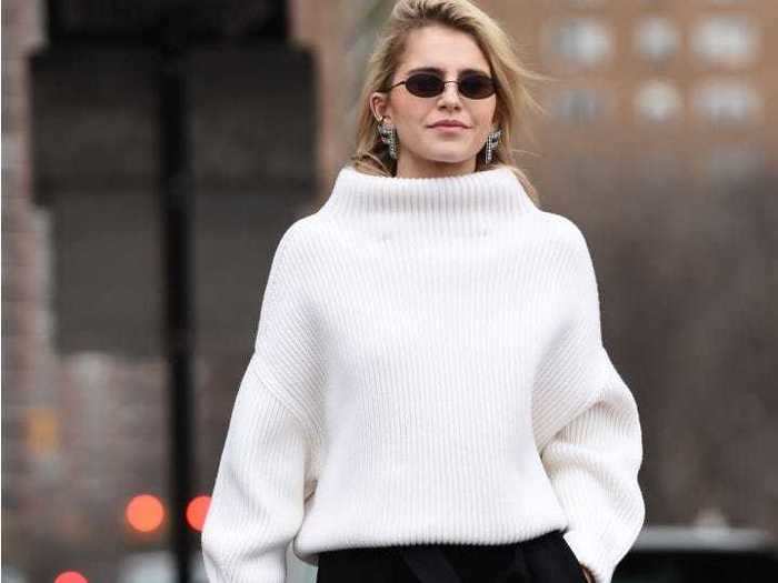 Wearing post-Labor Day white can come in the form of a comfortable sweater that makes a statement.