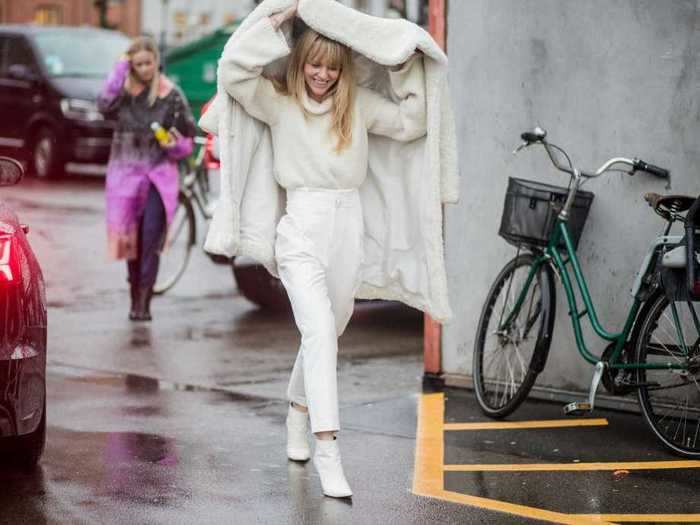 Wearing white from head-to-toe can make for a classy look that adds brightness to even the gloomiest of winter days.