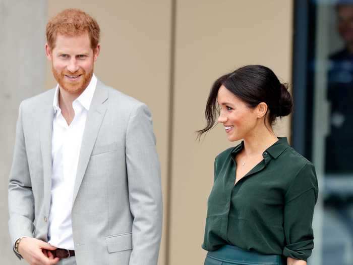 For an early October appearance, Meghan Markle wore an emerald pencil skirt and forest green blouse.