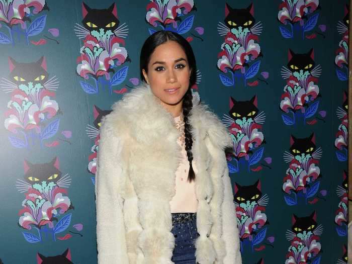 This faux-fur coat is the pinnacle of fall fashion. In 2014, Markle paired the off-white coat with a denim miniskirt, pastel pink top, and rose-colored clutch.