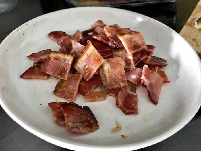 I let the bacon cool, then used scissors to chop it up into small pieces.