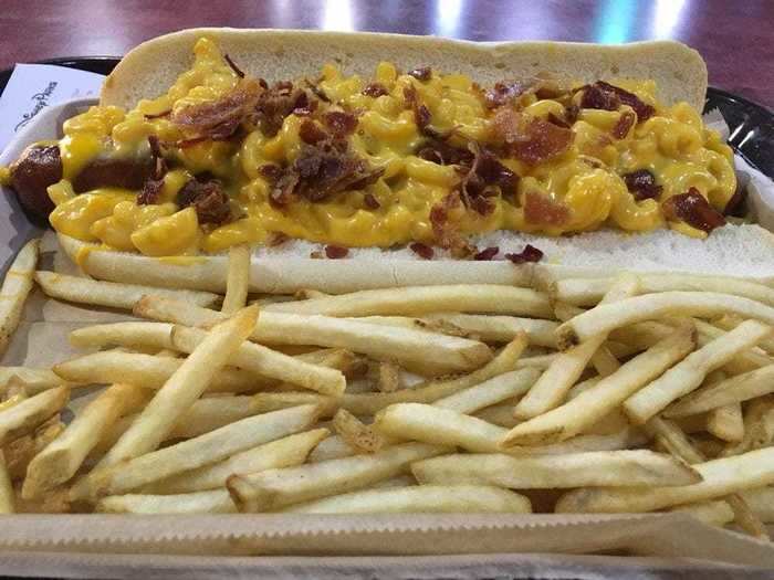 The bacon mac-and-cheese dog from All-Star Movies resort World Premiere food court goes great with fries.