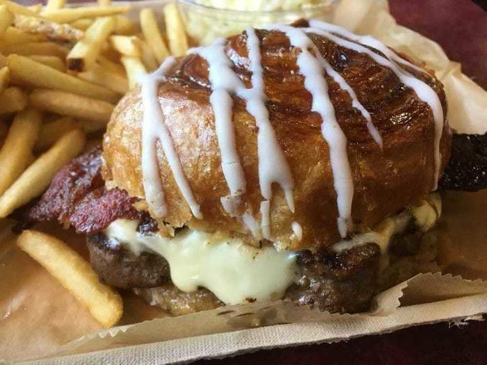 The cinnamon bun and candied bacon cheeseburger from All-Star Movies Resort World Premiere food court is a new level of decadence.