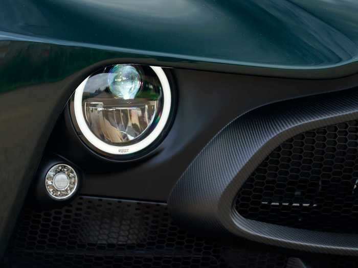 Finished in a throwback dark green, the car sports a full carbon-fiber body and chassis.