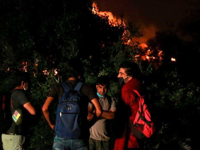 A local official said the fire was "premeditated" and that "the tents were empty." The United Nations Refugee Agency said friction between nearby "villages and asylum seekers" could be to blame.