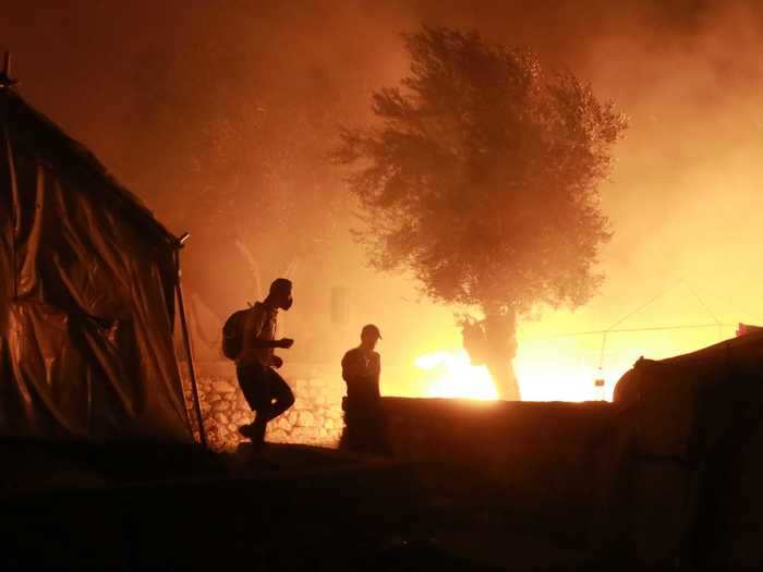 Flames took over the camp Wednesday at 2 a.m., prompting thousands of inhabitants to flee the site. The fires reportedly started in different areas of the camp.