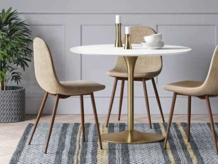 This round table can add a modern vibe to your kitchen or dining area.