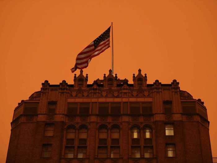 The eerie orange color is because of a phenomenon known as Mie scattering.