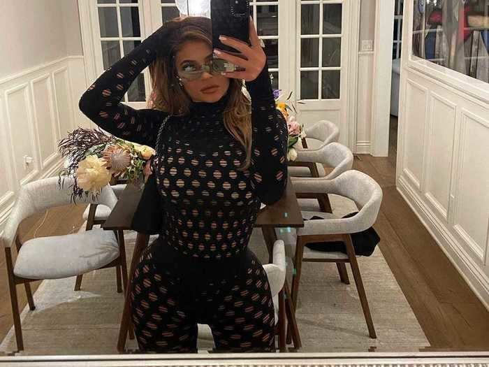 In September, Jenner shared a never-before-seen photo of herself wearing a see-through Maisie Wilen turtleneck and the matching leggings.