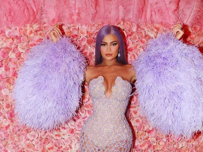 She chose a bold look for the 2019 Met Gala. Jenner wore a purple Versace dress that was designed with a see-through skirt and feathers.