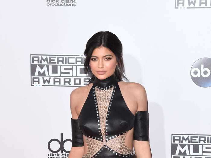She looked edgy at the 2015 American Music Awards in a leather Bryan Hearns dress.