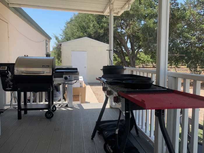 The Camp Chef Woodwind Wifi 24 (right), and its predecessor, the Camp Chef Pro 90X (left)