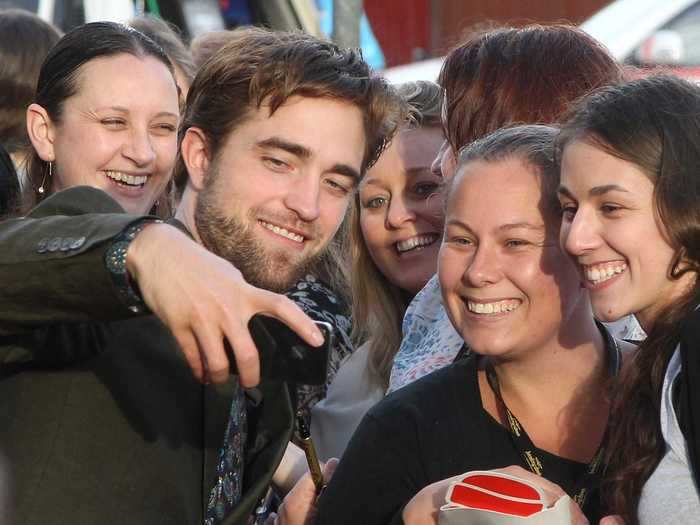 During the "Twilight" years, diehard fans (also known as Twihards), camped out for hours outside premieres and other events to catch a glimpse of Pattinson or get a photo with him if they were lucky.